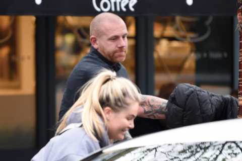 Molly-Mae Hague hides under a coat with her new bodyguard after hiring 24/7 security following..