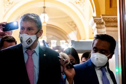 Democrats lobby Manchin, a critical swing vote, as they race to seal a deal on their domestic..
