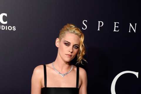 Kristen Stewart stuns in a crop top and sheer skirt at Spencer premiere
