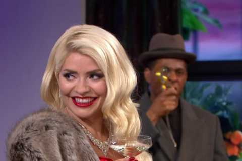 Holly Willoughby stuns in sexy red dress as Cluedo’s Miss Scarlett for This Morning Halloween..