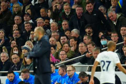 Raging Tottenham fans held back by stewards after blazing row breaks out in stands over Nuno during ..