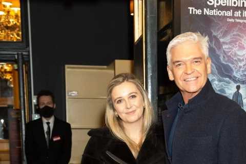 Phillip Schofield cuddles up to rarely-seen daughter Molly, 28, on London theatre trip