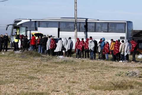 New row with France erupts as record 853 migrants make it to Britain in small boats in just ONE day