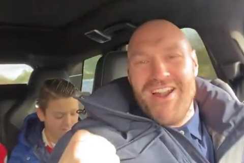 Pumped-up Man Utd fan Tyson Fury screams ‘come on the Reds’ as he takes kids to Old Trafford for..