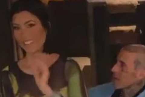 Kourtney Kardashian’s fans think she’s pregnant as Travis Barker rubs her belly at Kris Jenner’s..