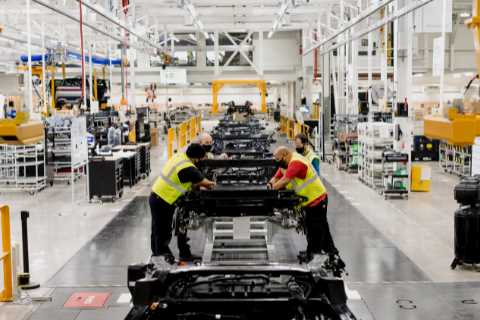 Rivian, the electric-truck maker, soars in early trading after its I.P.O.
