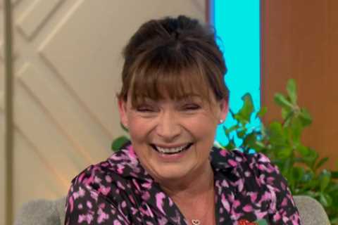 Lorraine bursts into giggles as her top button pops off mid-interview with The Wanted