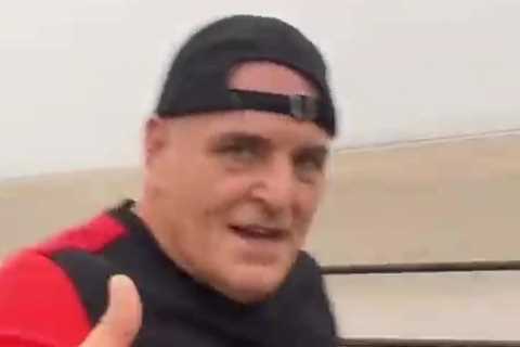 Tyson Fury jogs along drizzly Morecambe beach with Joseph Parker, dad John and bro Tommy ahead of..