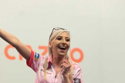 Fallon Sherrock becomes first woman EVER to reach knockout stages of Grand Slam of Darts with..