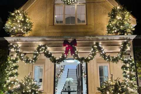 Olivia Bowen reveals her home’s incredible Christmas makeover with huge bow and four trees