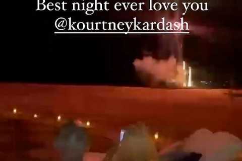 Kourtney Kardashian &amp; fiancé Travis Barker watch Christmas movies &amp; fireworks on the beach..