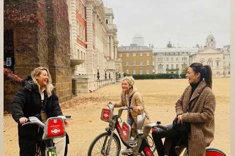 Michelle Keegan giggles as she rides around London on Boris bikes with pals