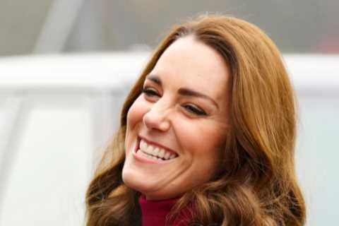 Kate Middleton beams in red as she meets students for science lesson to raise awareness for early..