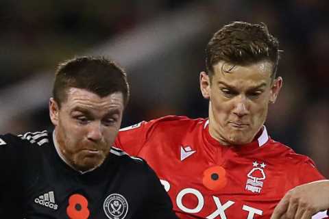 Sheffield United star John Fleck leaves stadium in ambulance after collapsing on pitch in worrying..