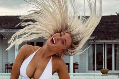 Love Island’s Lucie Donlan gives her hair a twirl on a Maldives beach