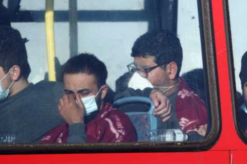 Dozens more migrants arrived in Britain yesterday amid political bickering between PM and Macron