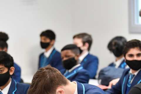 Head teachers warned against shutting schools early as experts say jabs will resist new mutant..