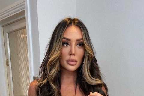 Charlotte Crosby moves into convicted criminal boyfriend’s swanky Manchester flat just four weeks..
