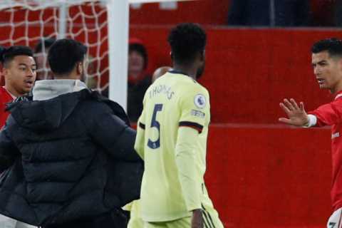 Pitch invader at Man Utd vs Arsenal clash gets slammed to the ground by security as Cristiano..