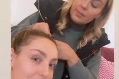 Strictly star Amy Dowden gets a visit from rarely seen twin sister Becky after hospital dash