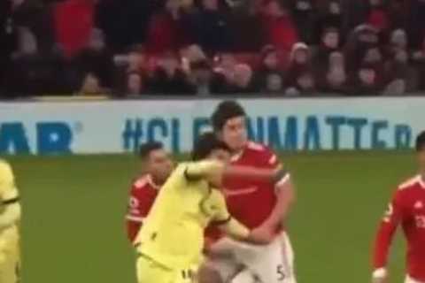 Arsenal fans fume as Takehiro Tomiyasu penalty claim IGNORED by VAR after Harry Maguire pulls arm..