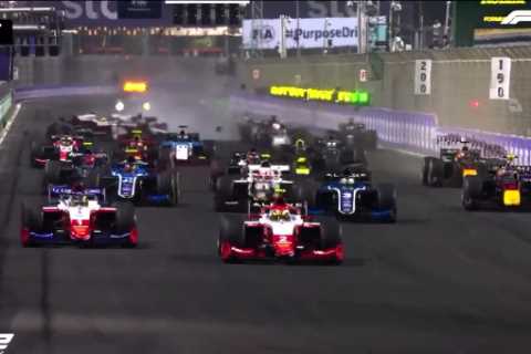 F2 driver Fittipaldi smashes into back of stalled car in huge crash with part of vehicle flying..