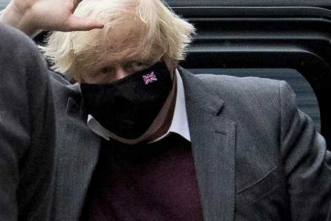 Battered Boris Johnson defies critics by vowing to stay on as Tory leader and fight next general..