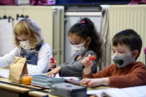 No guarantee all schools will open in January, minister warns as he urges Brits to get booster