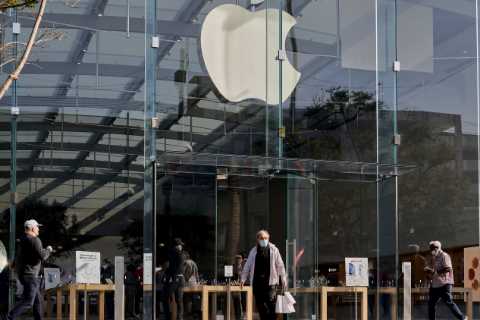 From mandates to masks, how some big companies are adjusting to Omicron.