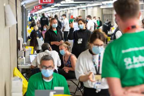 How can I volunteer for the vaccine rollout?