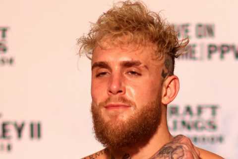 Jake Paul makes throat-slitting gesture during weigh-in for Tyron Woodley rematch and comes in..