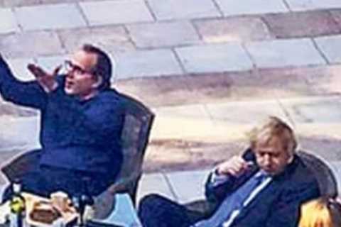 Boris Johnson pictured with wine and cheese in Downing Street garden with colleagues during first..