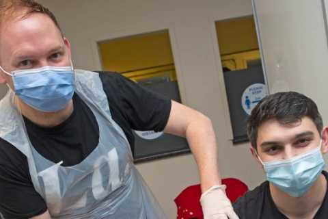 Almost two million people get booster jab over weekend as Britain battles against Omicron