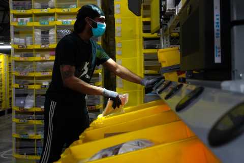 Amazon requires masks again at all U.S. warehouses.