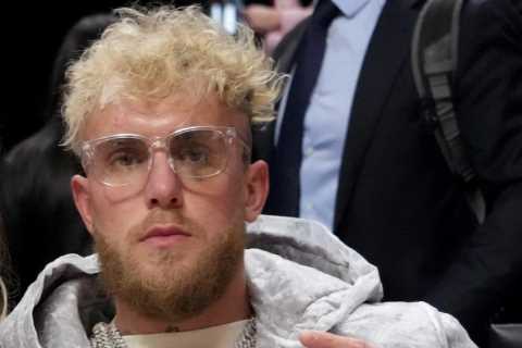 Watch as Jake Paul warned by security over courtside pranks as he and girlfriend Julia Rose watch..