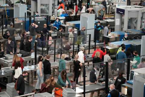 2,000 flights already canceled this weekend with more likely as Omicron wreaks havoc on holidays