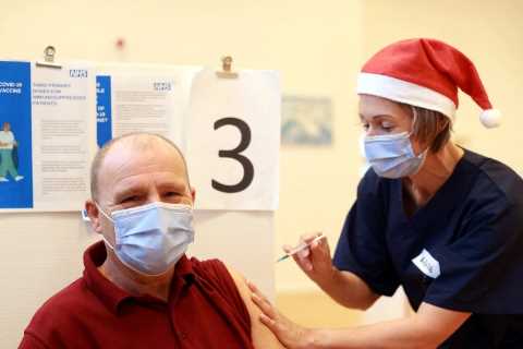 NHS heroes put Christmas celebrations on hold as they vaccinate thousands of people