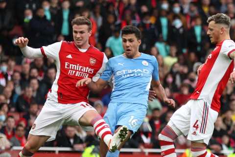 Watch as Rodri is pelted by bottles after taunting Arsenal fans with celebration as BT Sport..