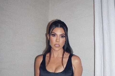 Kourtney Kardashian claps back at fan who accused the star of not spending time with son Mason, 12