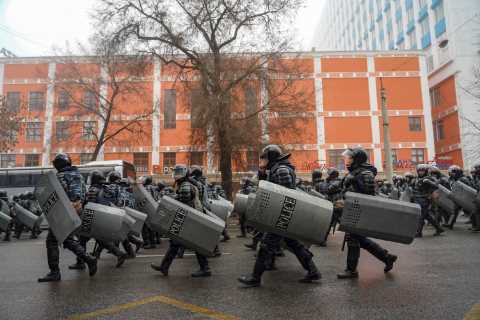 Riot police march through Kazakhstan after crushing  protestors with the help of Putin