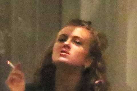 Maisie Smith puffs a cigarette with Strictly tour co-stars after cuddling up to Kai Widdrington
