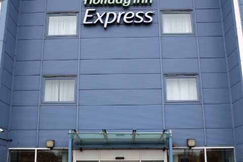 Hotel that houses Channel migrants costing taxpayers £1.5m is EMPTY after being block-booked by..