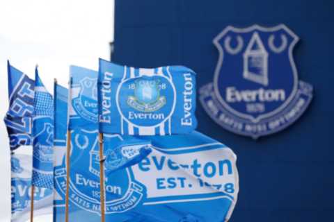 Wife of Everton footballer arrested on suspicion of child sex offences is standing by her man