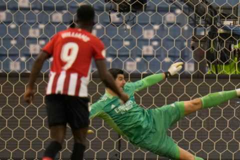 Watch ex-Chelsea star Courtois’ ridiculous 88th-minute penalty save with his foot as Real Madrid..