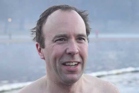 Frozen Matt Hancock does his best Daniel Craig impression with swim in the Serpentine