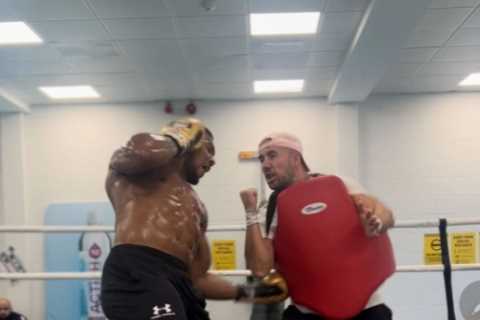 Anthony Joshua shows off ripped body in session with coach Angel Fernandez as part of new training..