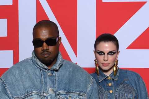 Kanye West and new girlfriend Julia Fox wear matching double denim as they attend first fashion..