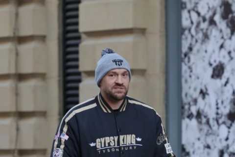 Tyson Fury spotted out in Manchester wearing branded training gear as he prepares for Brit war..