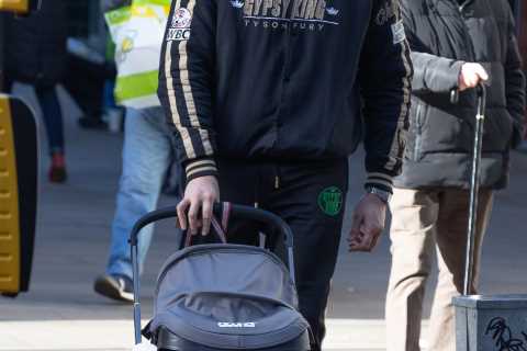 Paris and Tyson Fury spotted shopping in Manchester with baby Athena as Gypsy King pushes..