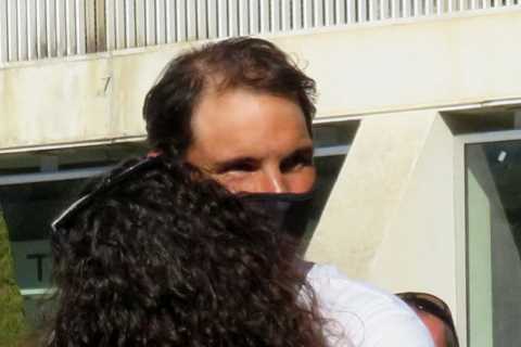 Rafael Nadal hugs stunning wife Xisca after touching down in Mallorca following historic Australian ..